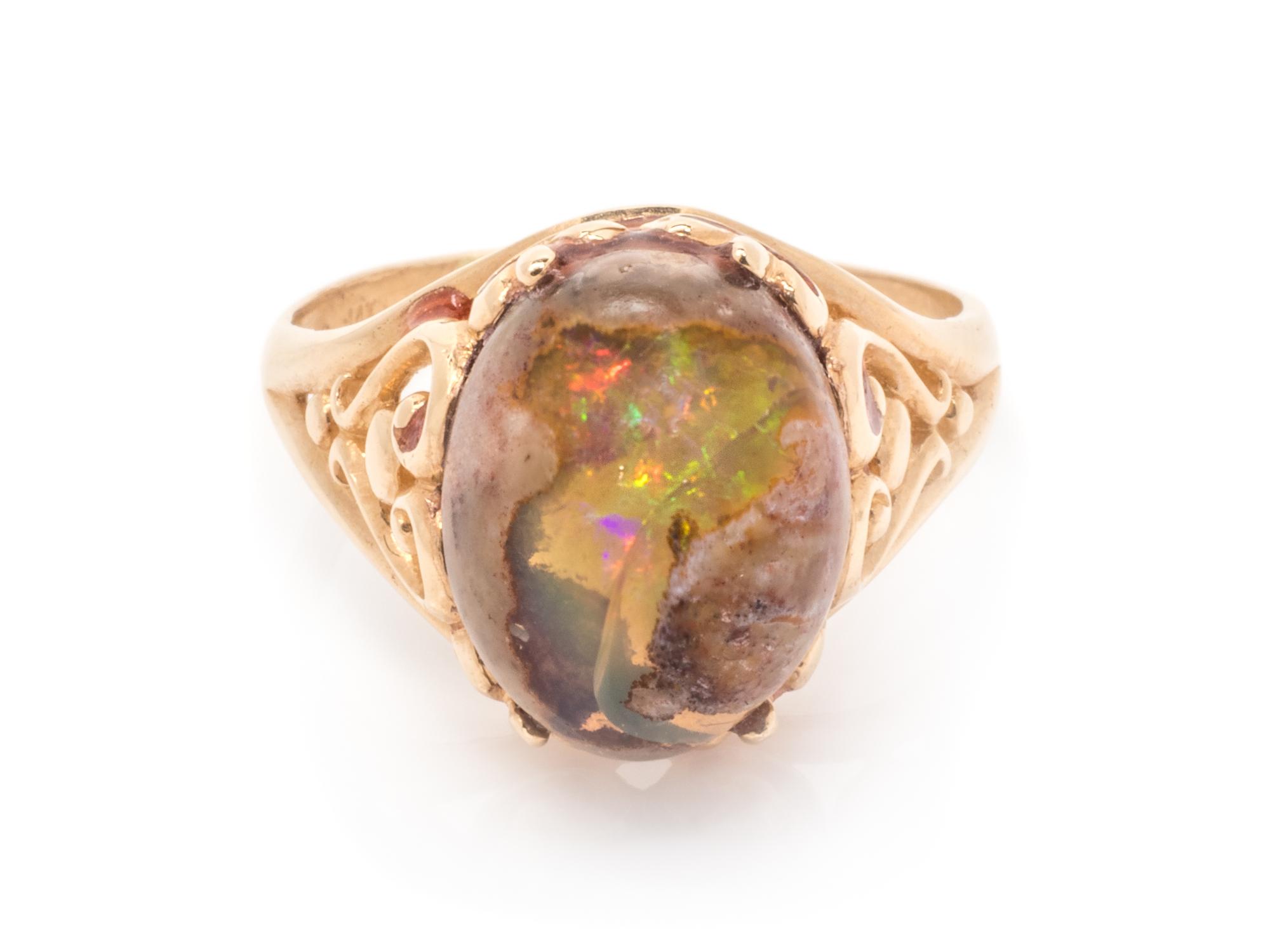 A 14 Karat Yellow Gold and Boulder Opal Ring,