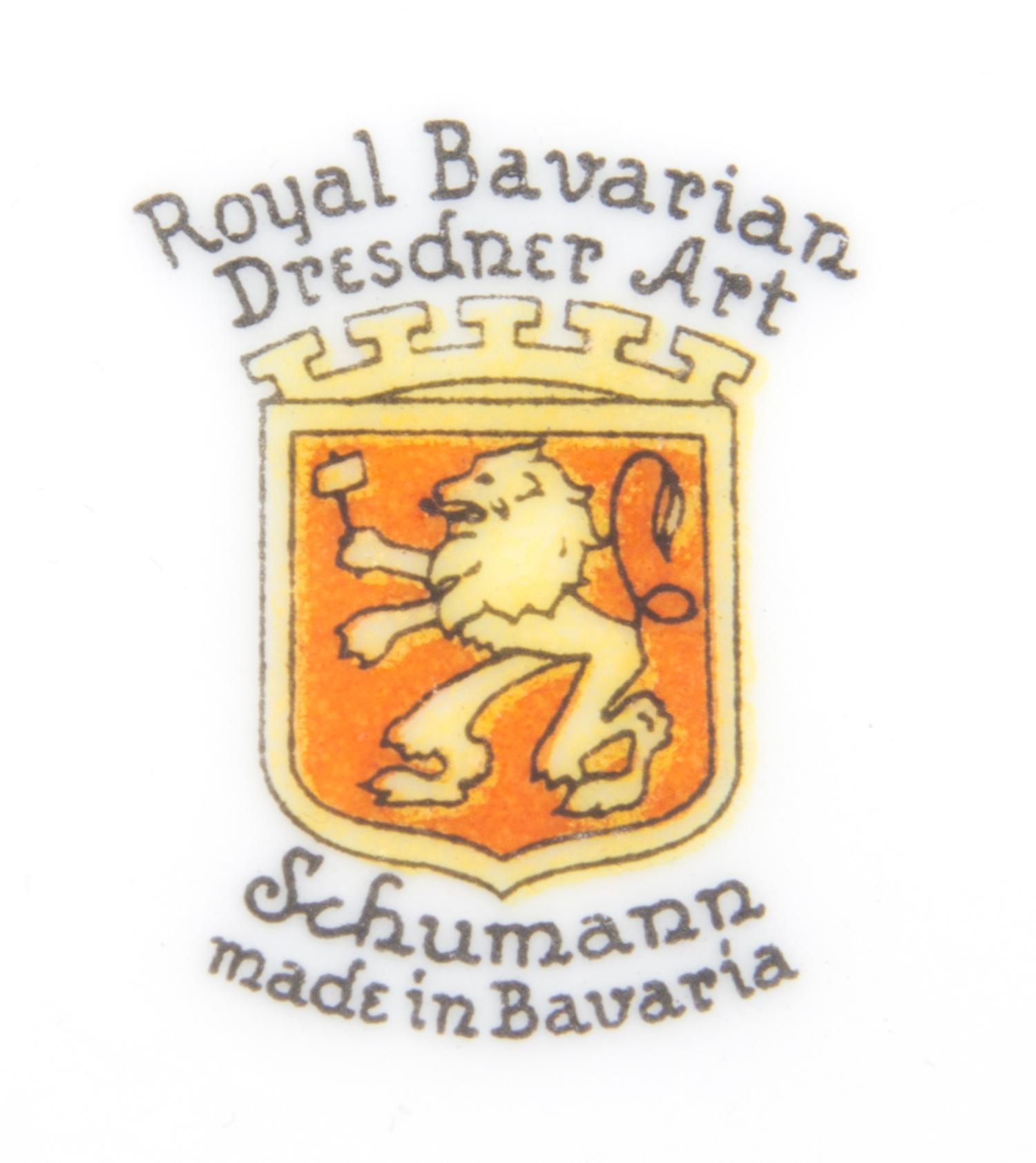 A Bavarian Porcelain Partial Dinner Service for Twelve, Schumann, Diameter of dinner plate 11 inches.