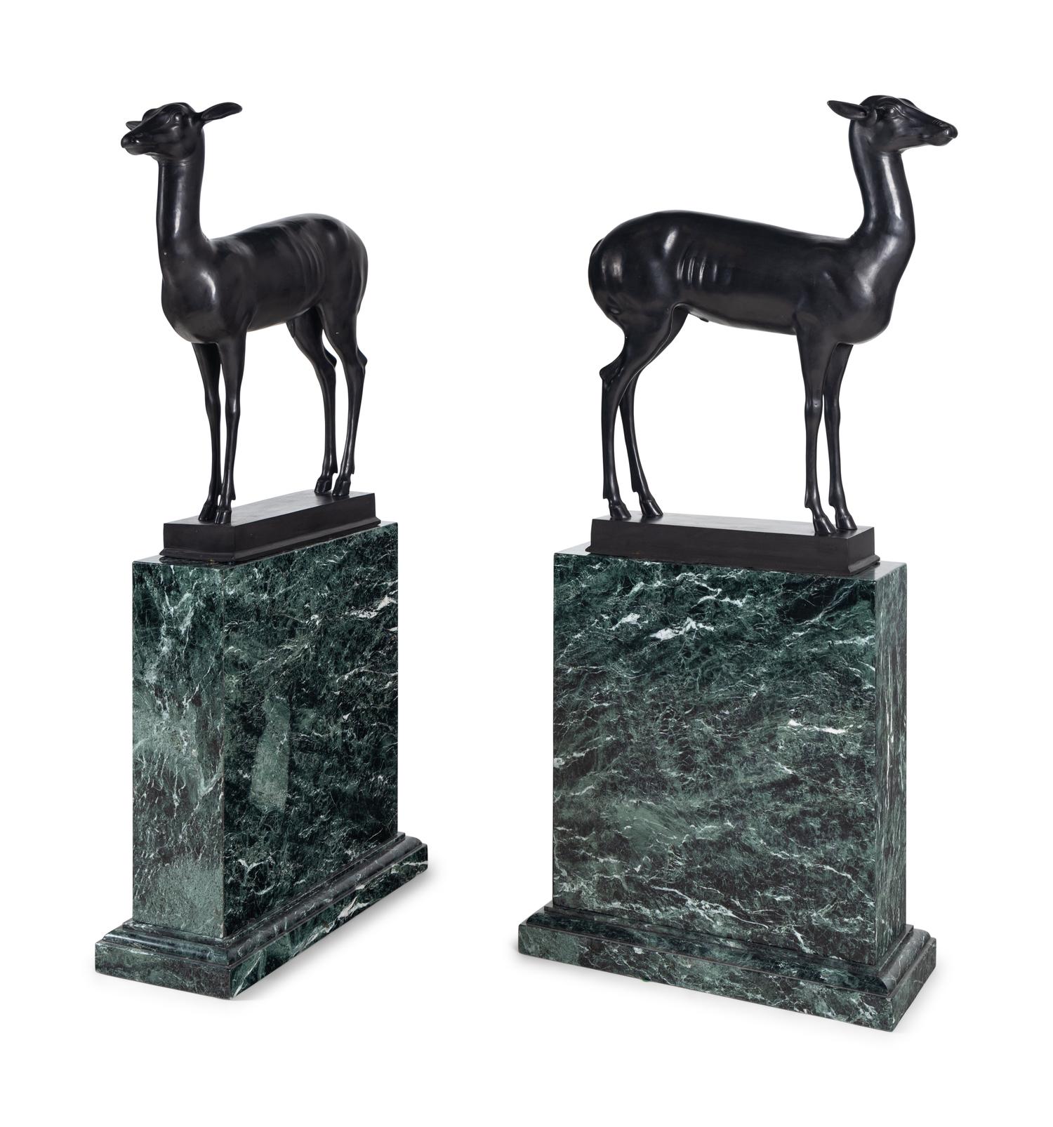 A Pair of Bronze Models of Pompeiian Deer on Marble Plinths