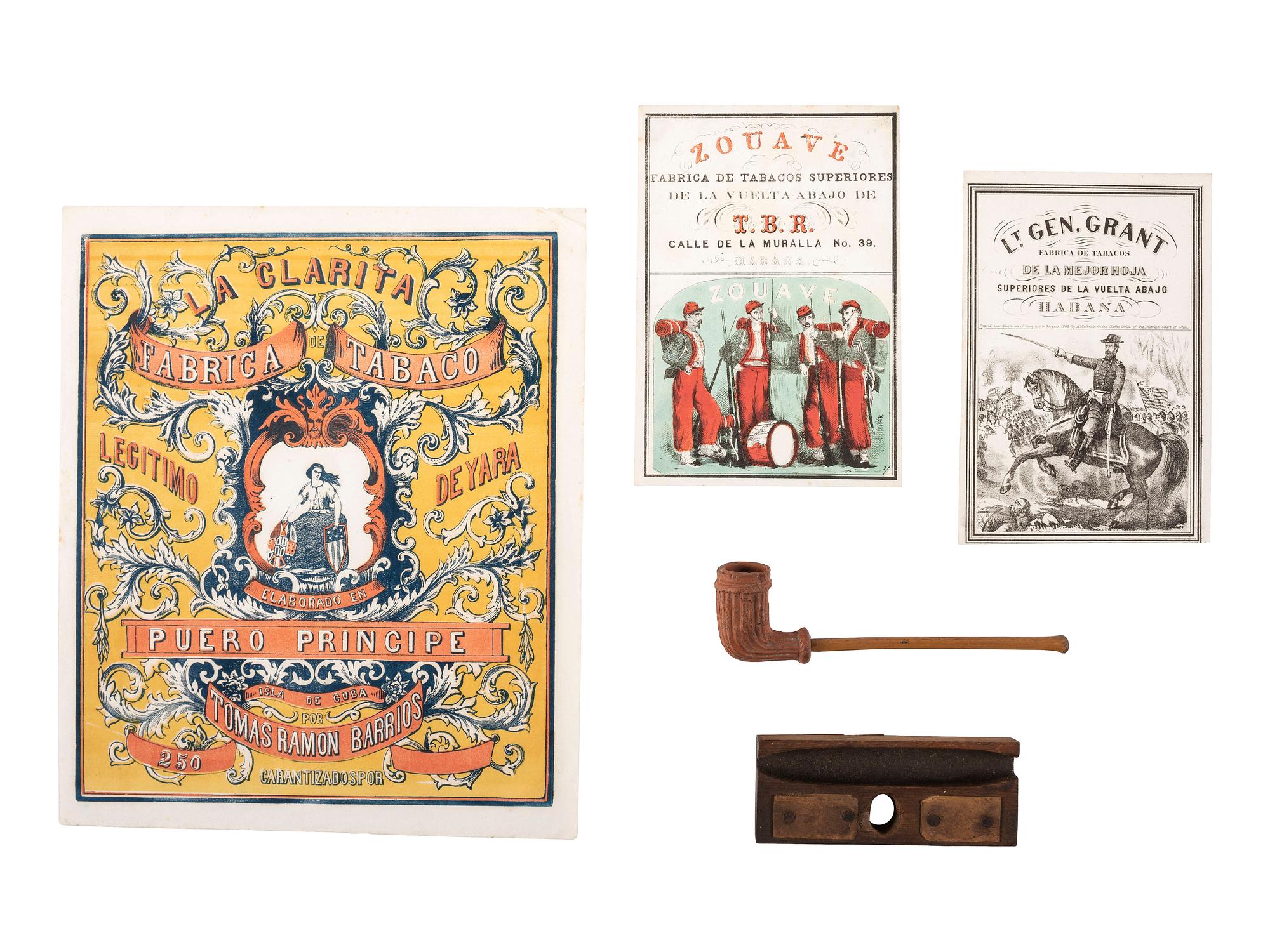 [CIVIL WAR]. A group of illustrated cigar labels, carved pipe, and cigar roller.