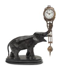 A Continental Cast Metal Elephant-Form Swinging Clock