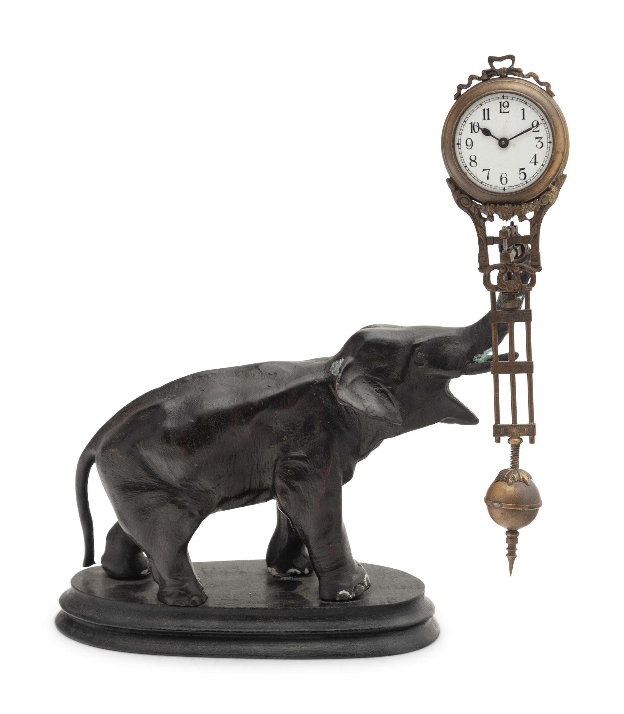 A Continental Cast Metal Elephant-Form Swinging Clock