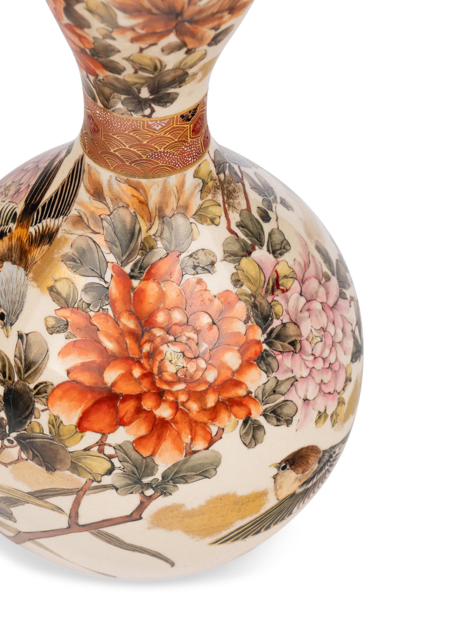 A Pair of Japanese Porcelain Double-Gourd Form Vases