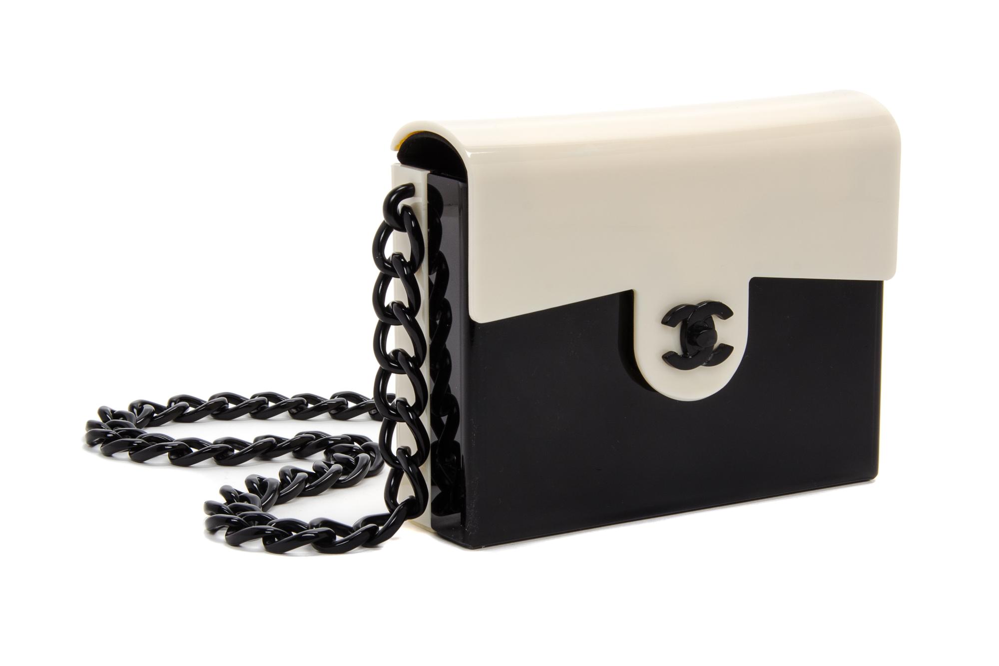 A Chanel Black and White Lucite Handbag, 6.75" x 5.5".