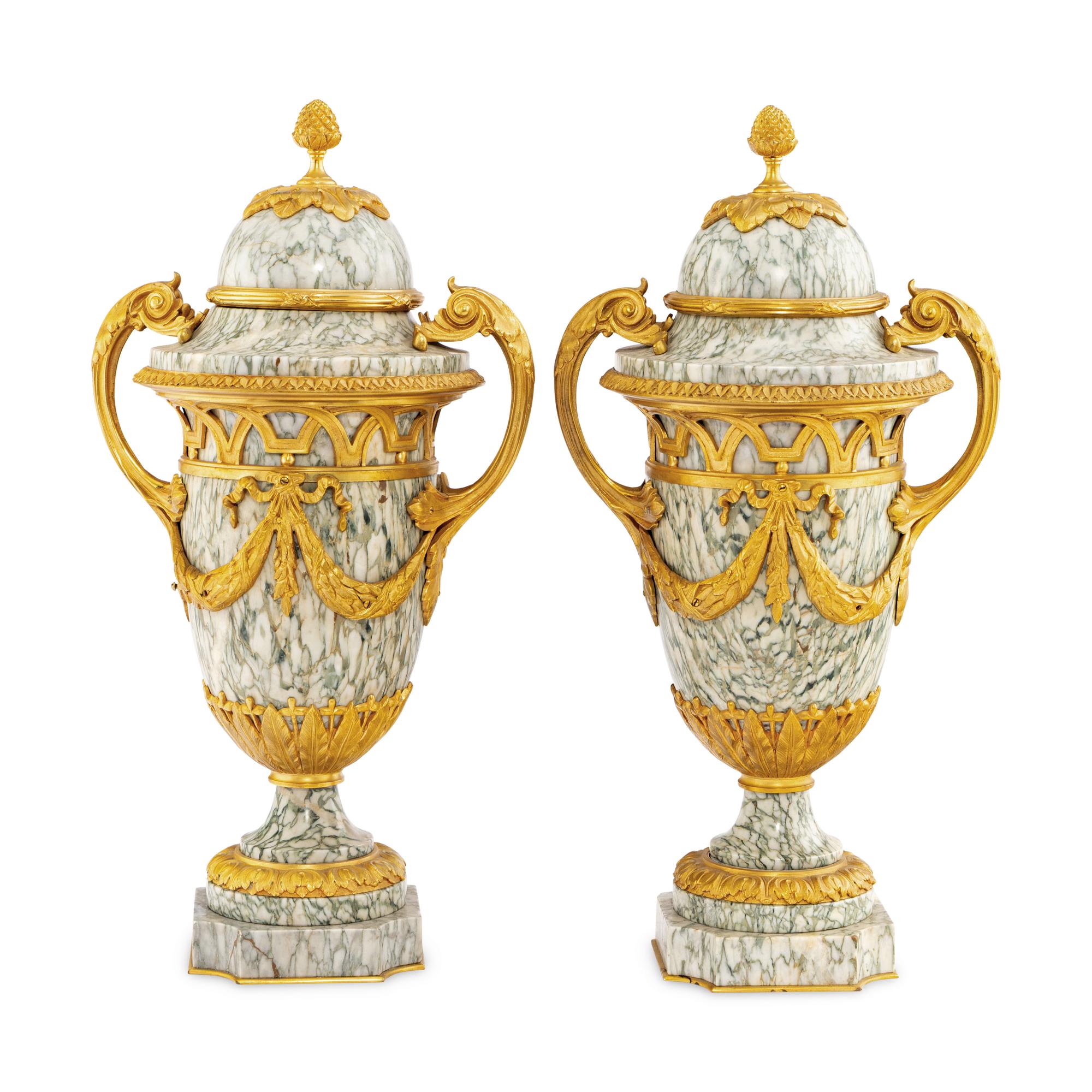 A Pair of Louis XVI Style Marble and Gilt Bronze Mounted Urns