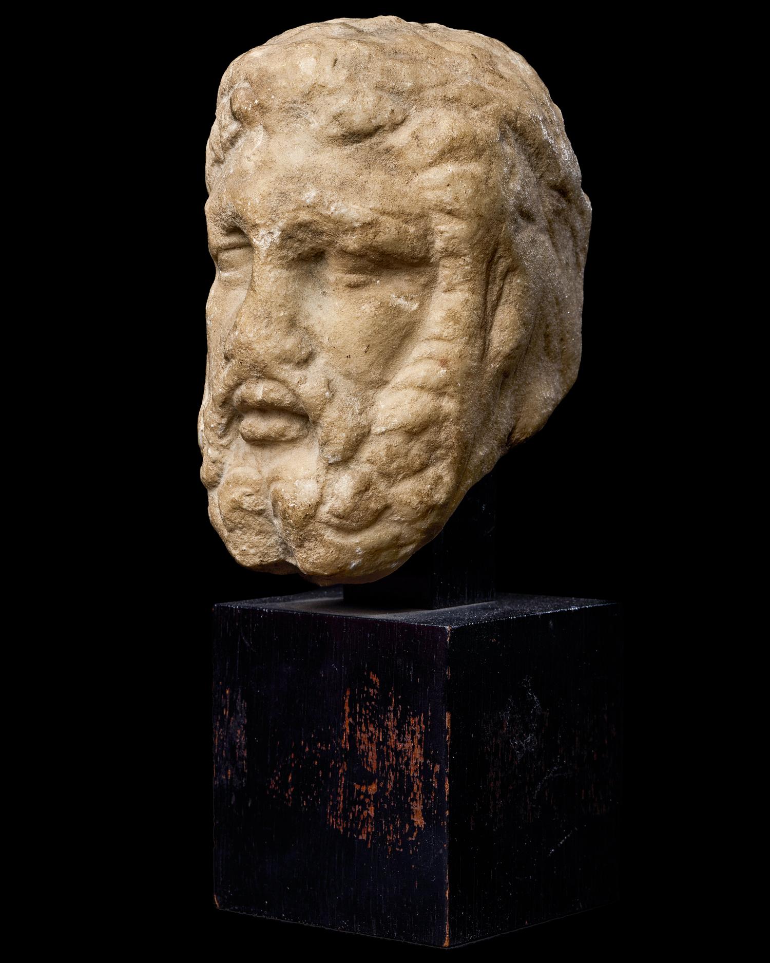 A Roman Marble Portrait Head of a Beaded Man
