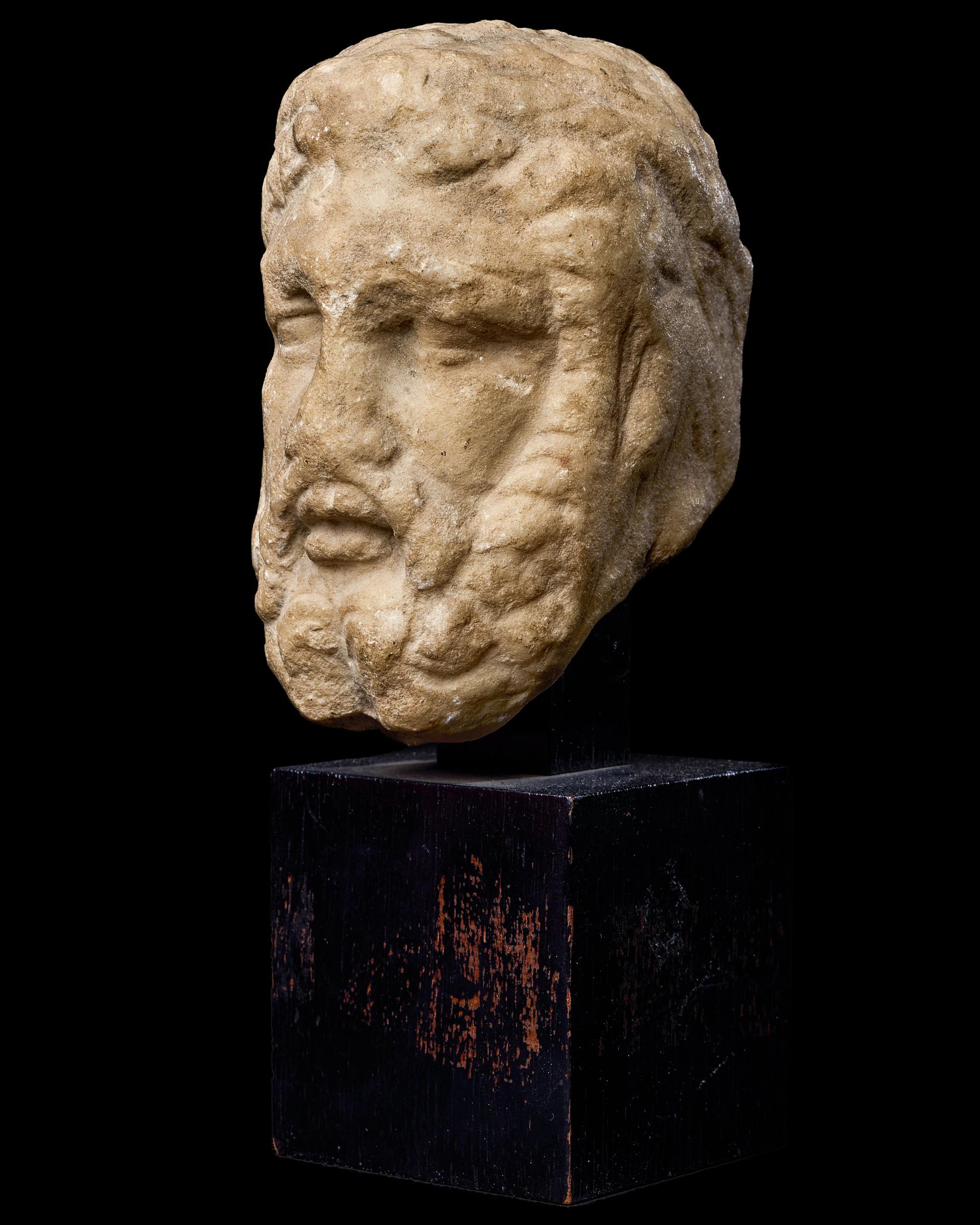 A Roman Marble Portrait Head of a Beaded Man
