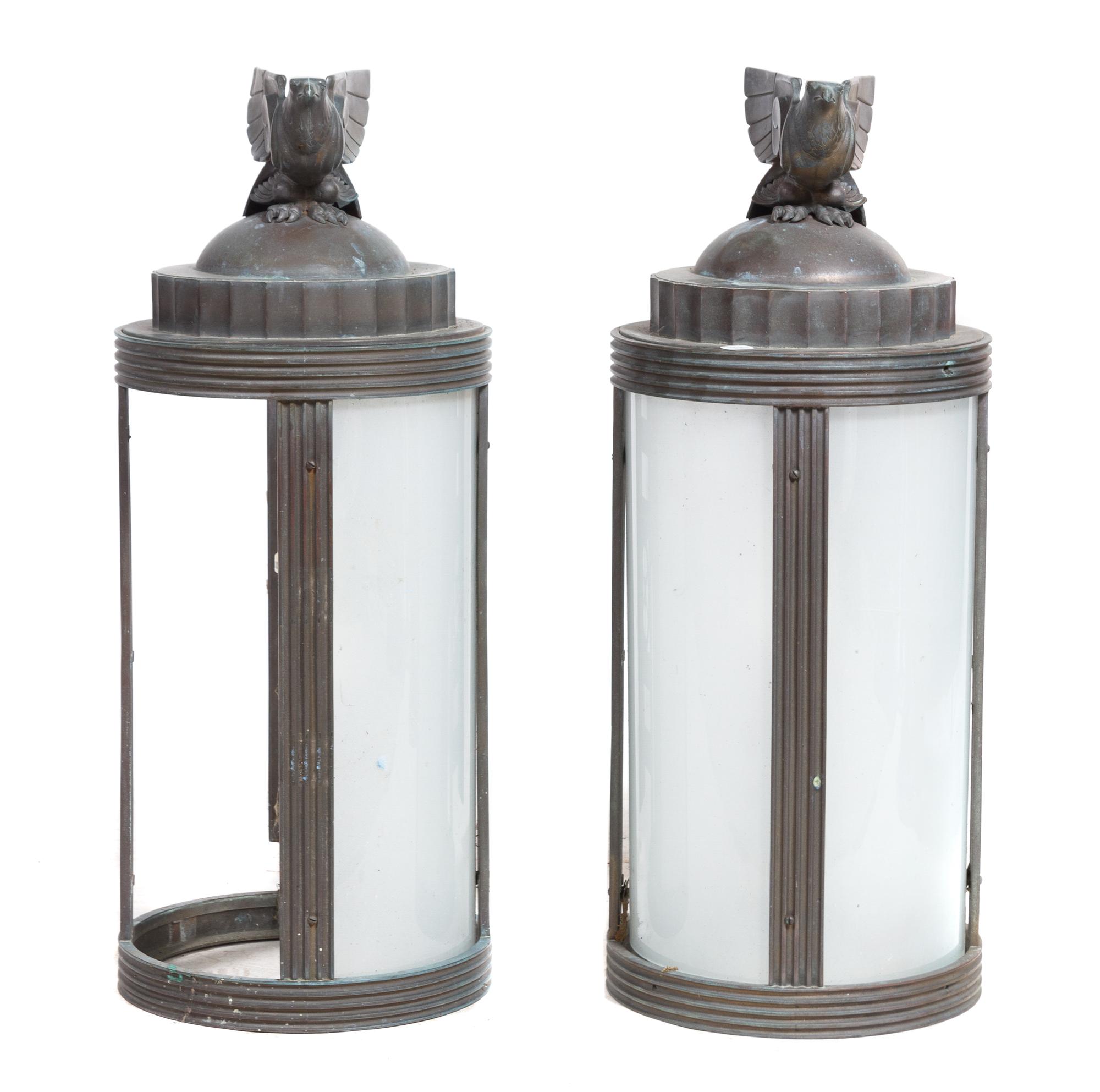 A Set of Four Art Deco Cast Metal Lanterns Height 30 inches.