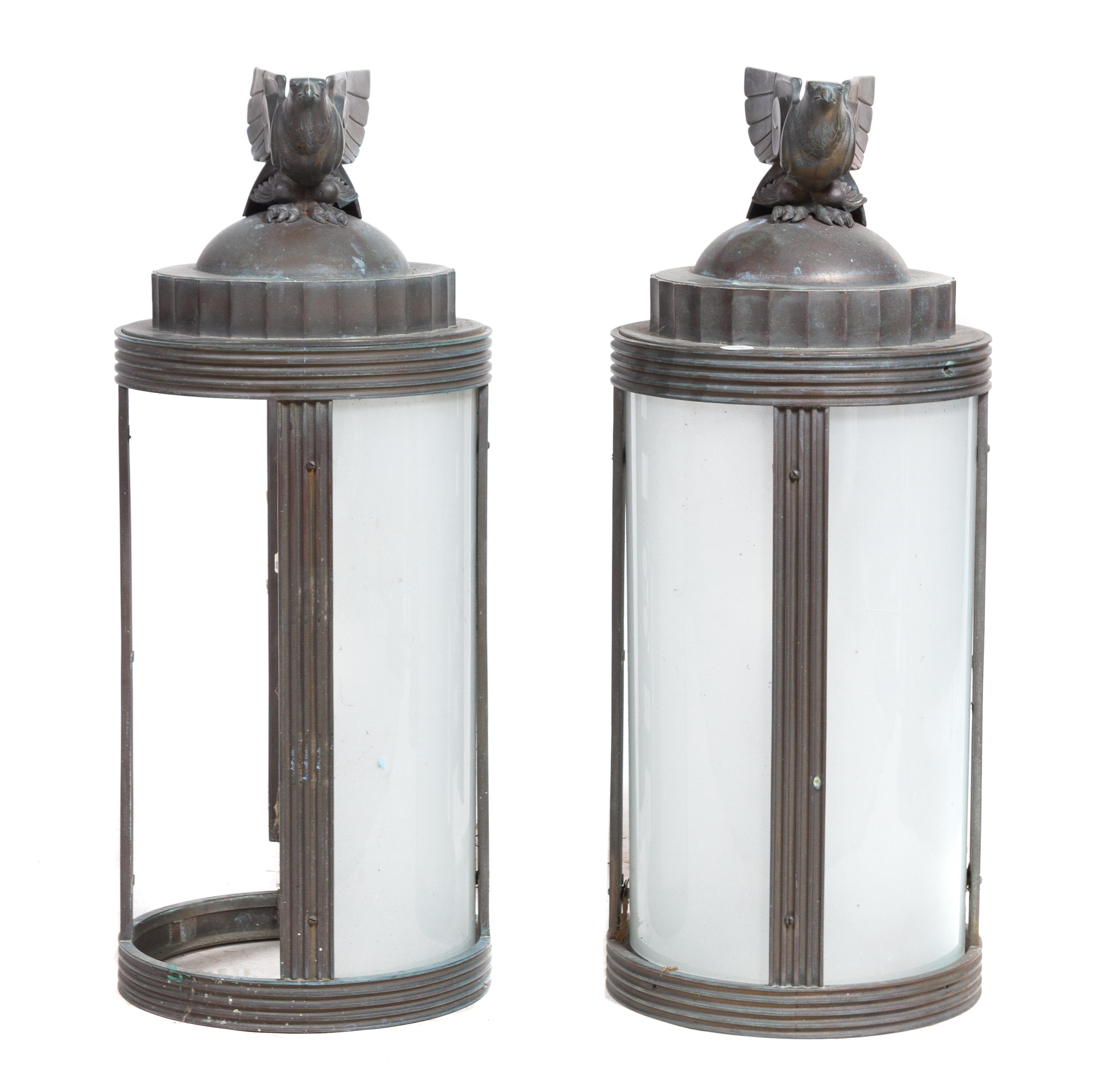 A Set of Four Art Deco Cast Metal Lanterns Height 30 inches.
