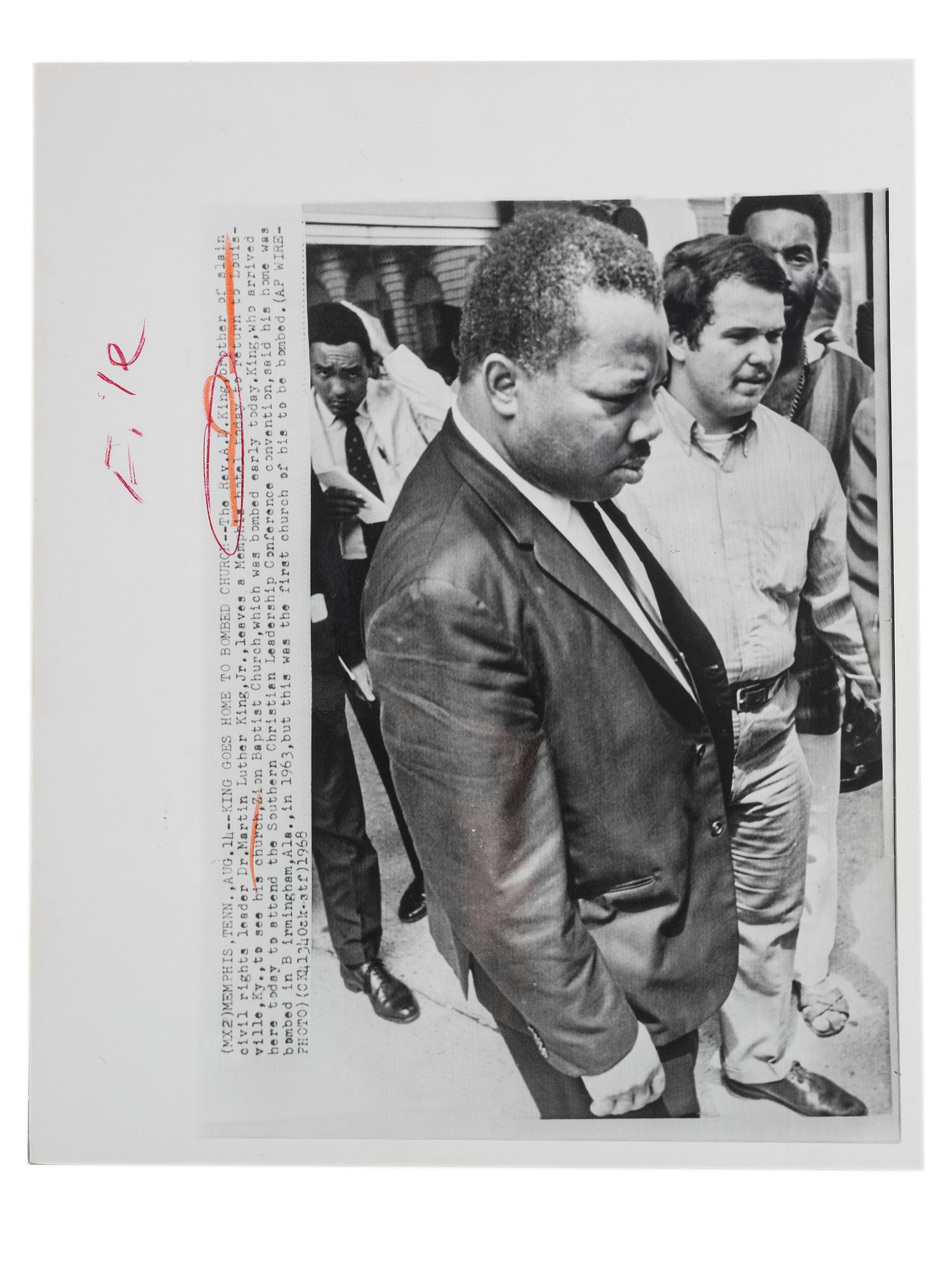 [CIVIL RIGHTS]. A group of 2 press photographs of Reverend A.D. Williams King, brother to Martin Luther King, Jr., comprising:
