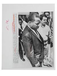 [CIVIL RIGHTS]. A group of 2 press photographs of Reverend A.D. Williams King, brother to Martin Luther King, Jr., comprising:
