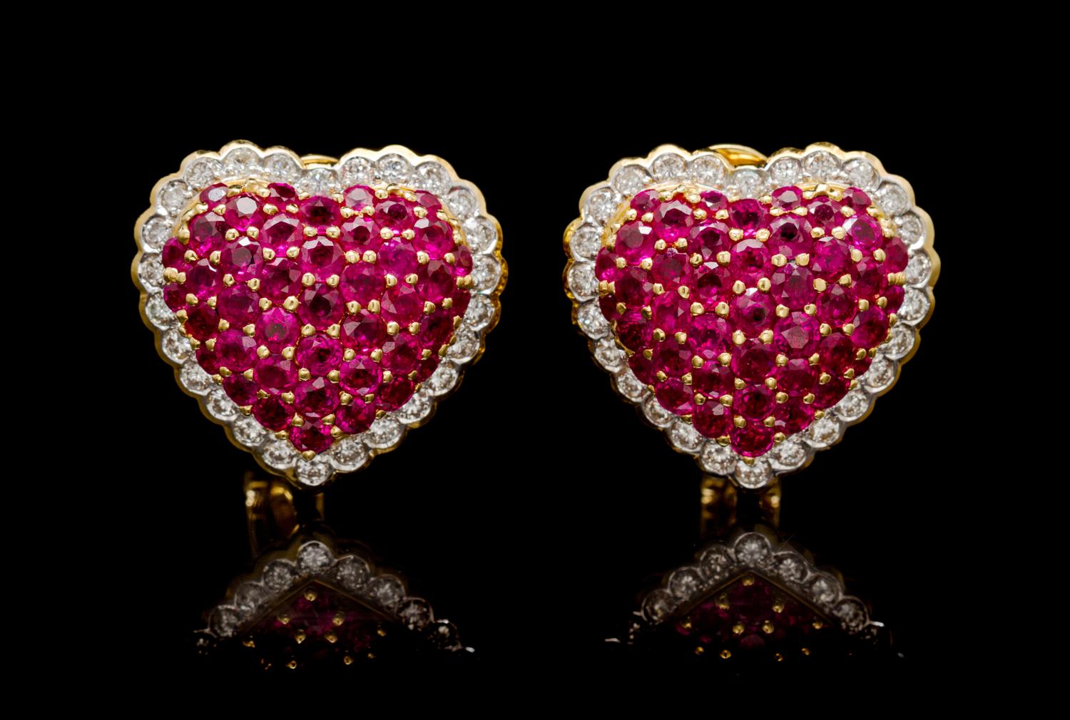 A Pair of 18 Karat Yellow Gold, Ruby and Diamond Heart Earclips, 17.30 dwts.