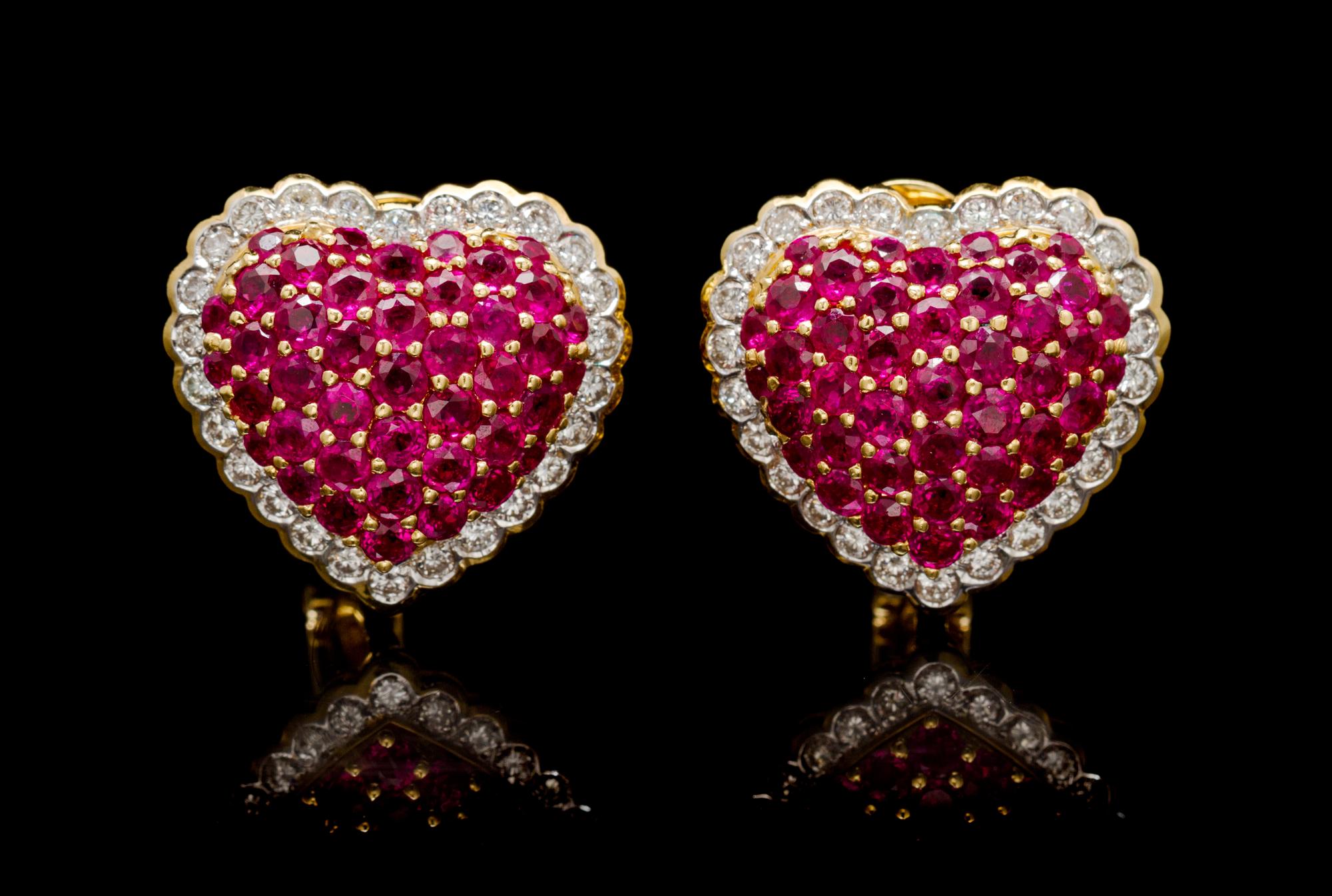 A Pair of 18 Karat Yellow Gold, Ruby and Diamond Heart Earclips, 17.30 dwts.
