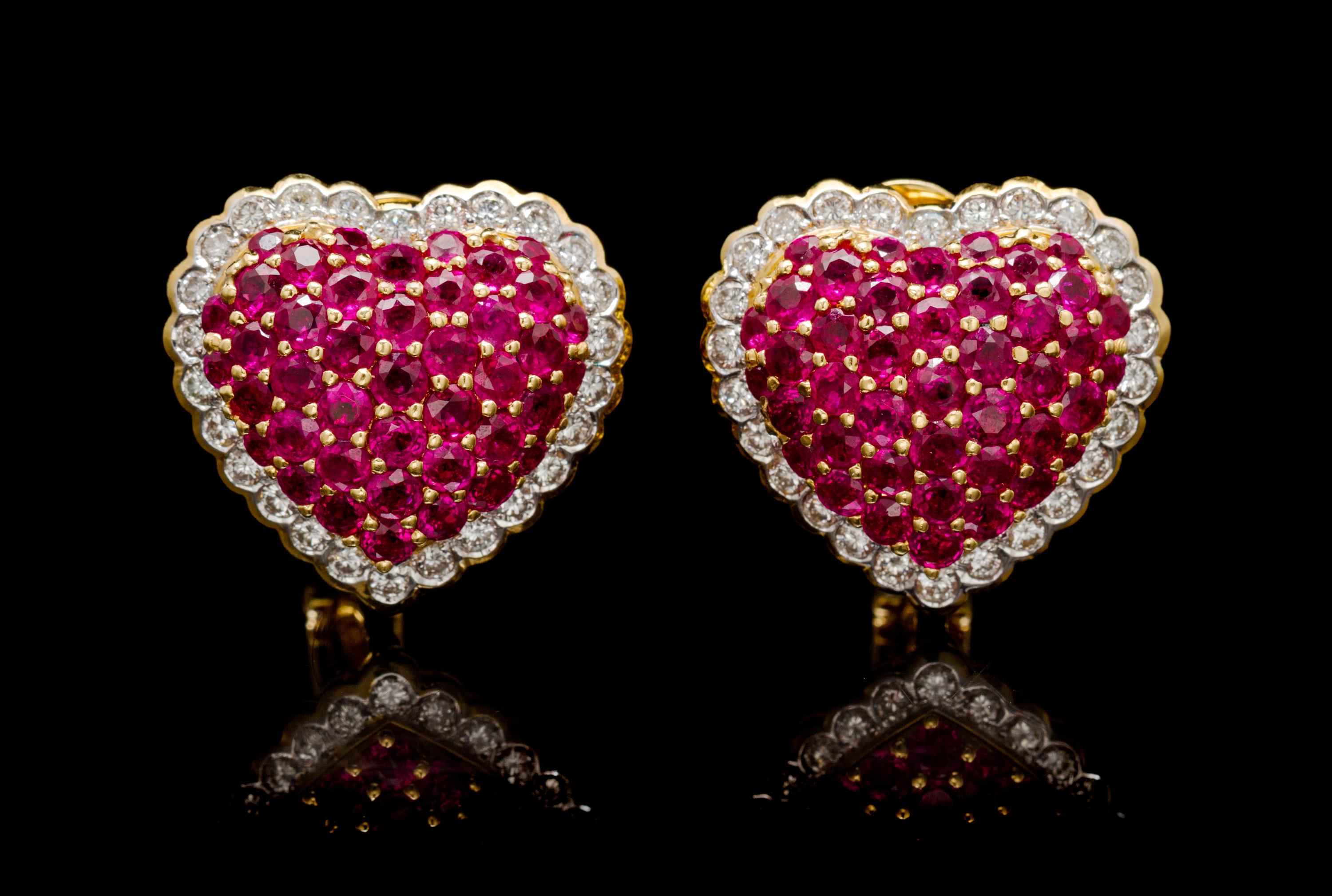 A Pair of 18 Karat Yellow Gold, Ruby and Diamond Heart Earclips, 17.30 dwts.