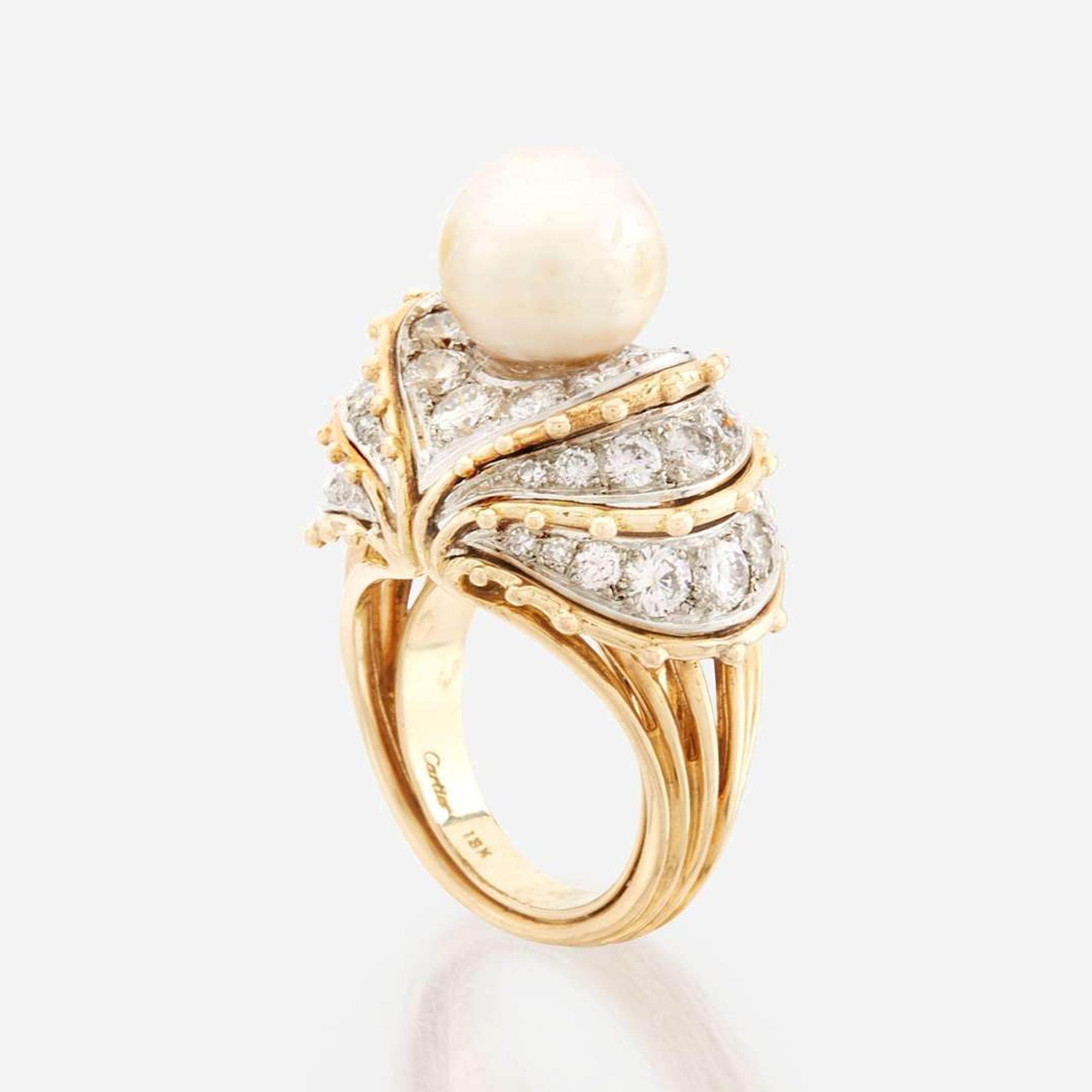 A cultured pearl, diamond, gold, and platinum ring