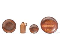 Three Glazed Redware Plates and a Small Glazed Redware Jug, 19th Century