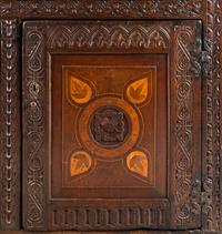 A Jacobean Carved Oak and Marquetry Court Cupboard
