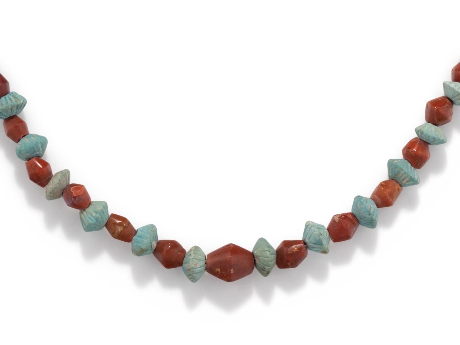 An Egyptian Carnelian and Faience Bead Necklace
