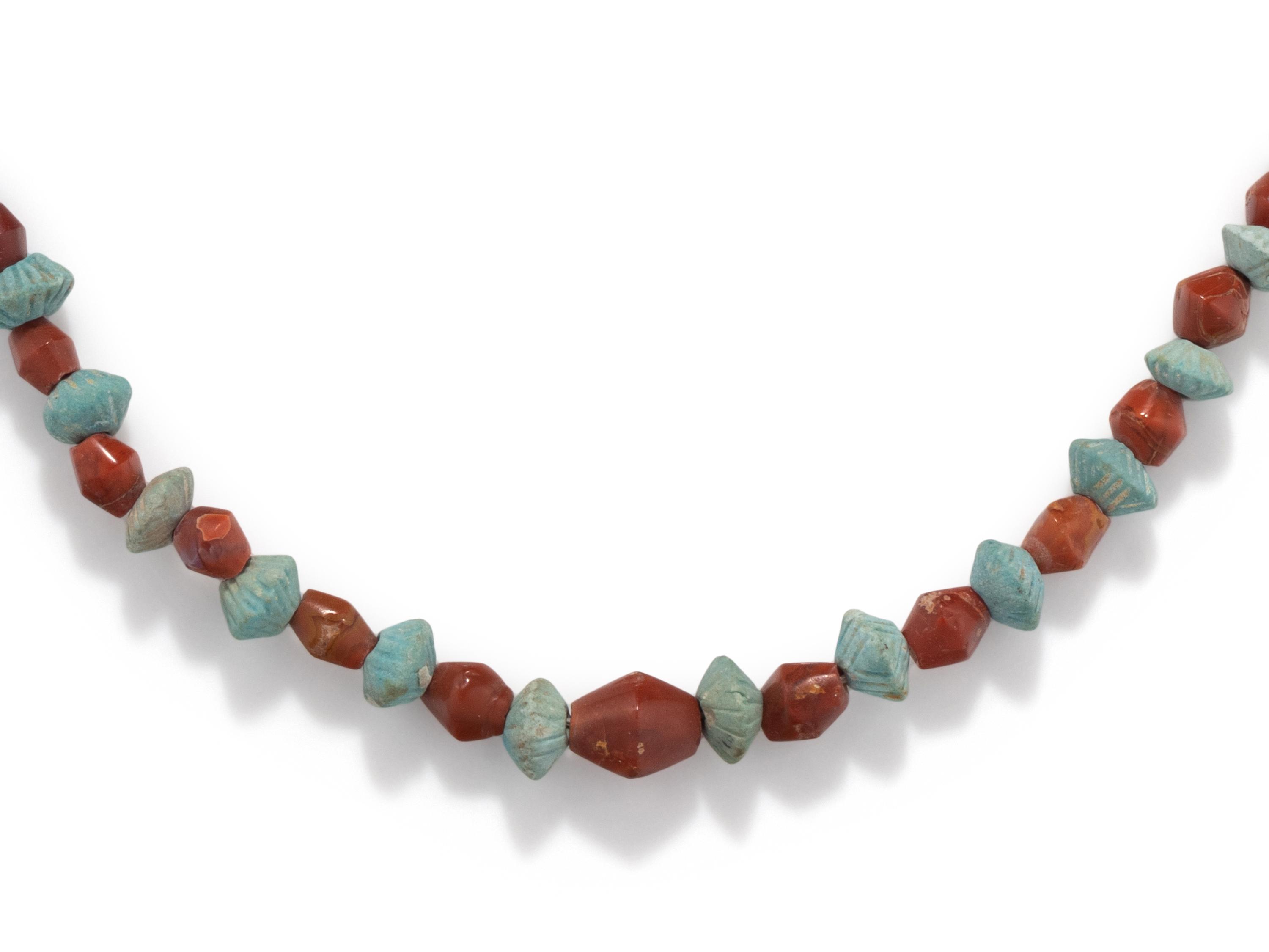 An Egyptian Carnelian and Faience Bead Necklace