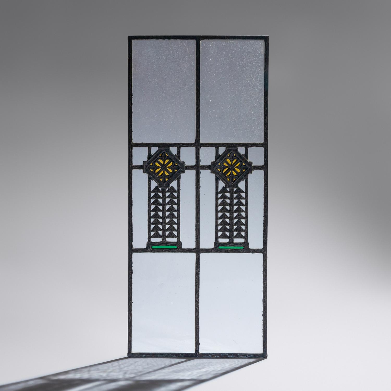 Window with cast quatrefoil medallion