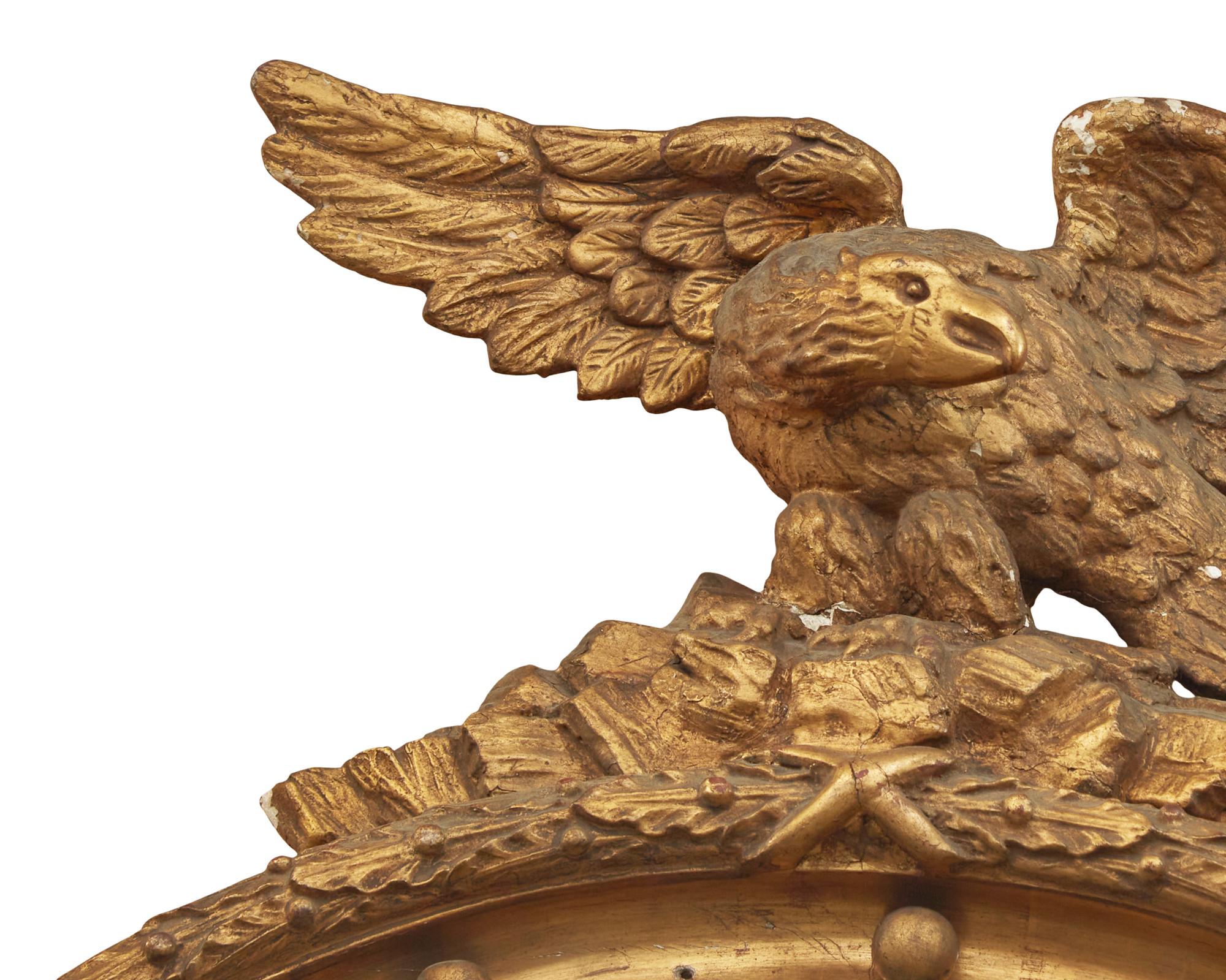 A Classical Giltwood Bull's Eye Looking Glass