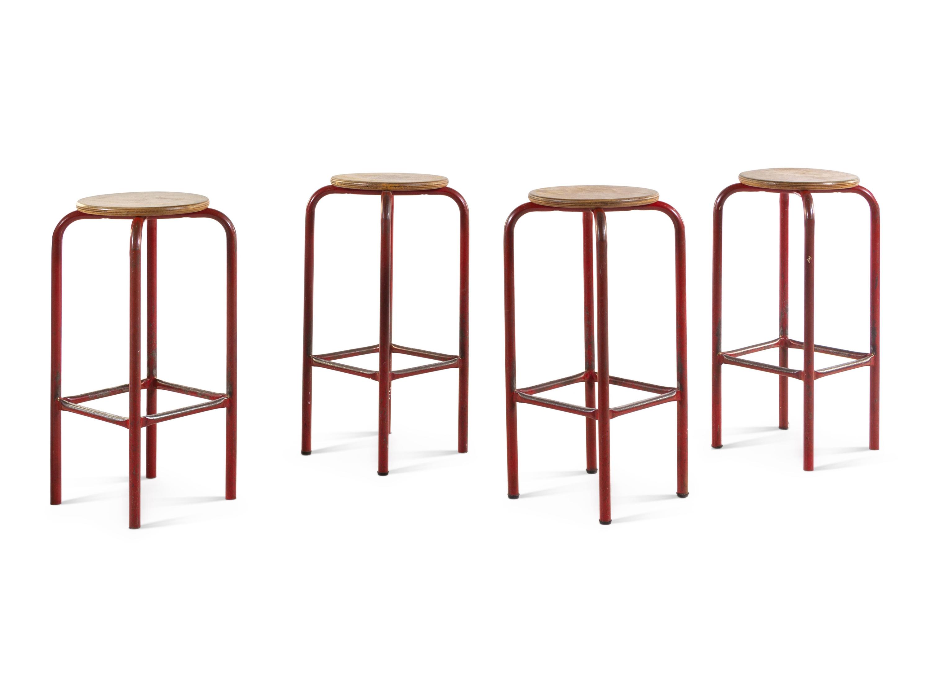 A Set of Four Painted Metal Stools