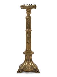 A Gothic Revival Gilt Metal Pricket