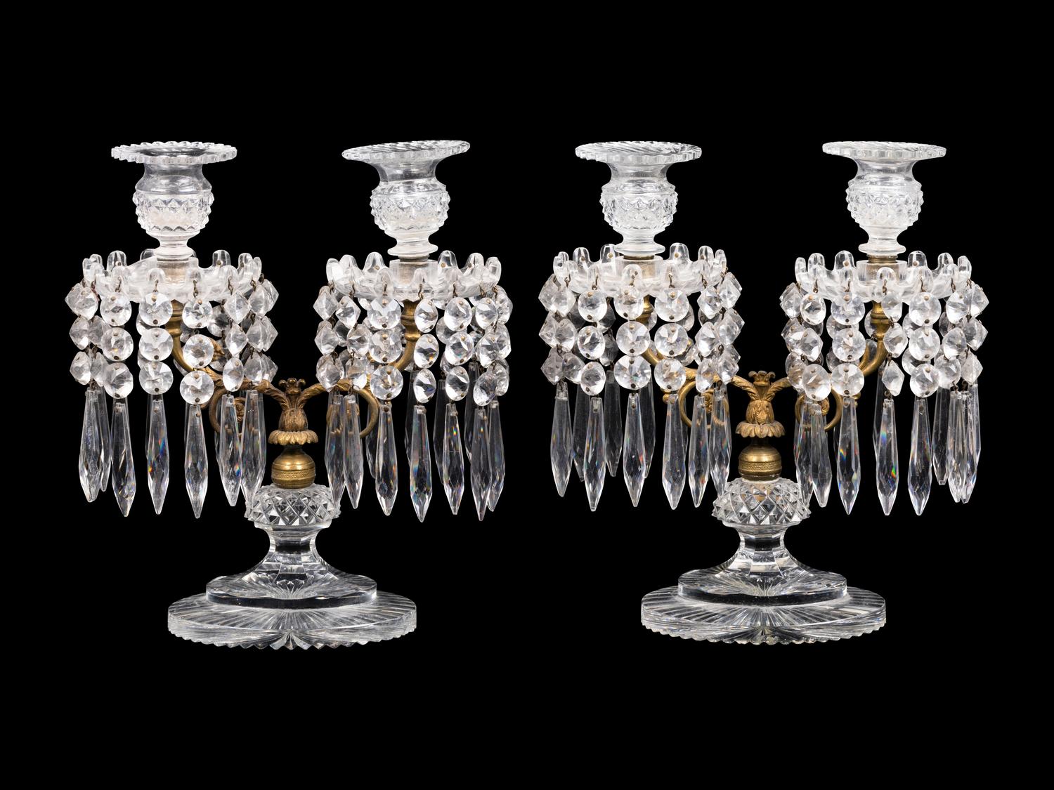 A Pair of Continental Gilt Metal and Cut Glass Two-Light Candelabra