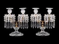 A Pair of Continental Gilt Metal and Cut Glass Two-Light Candelabra