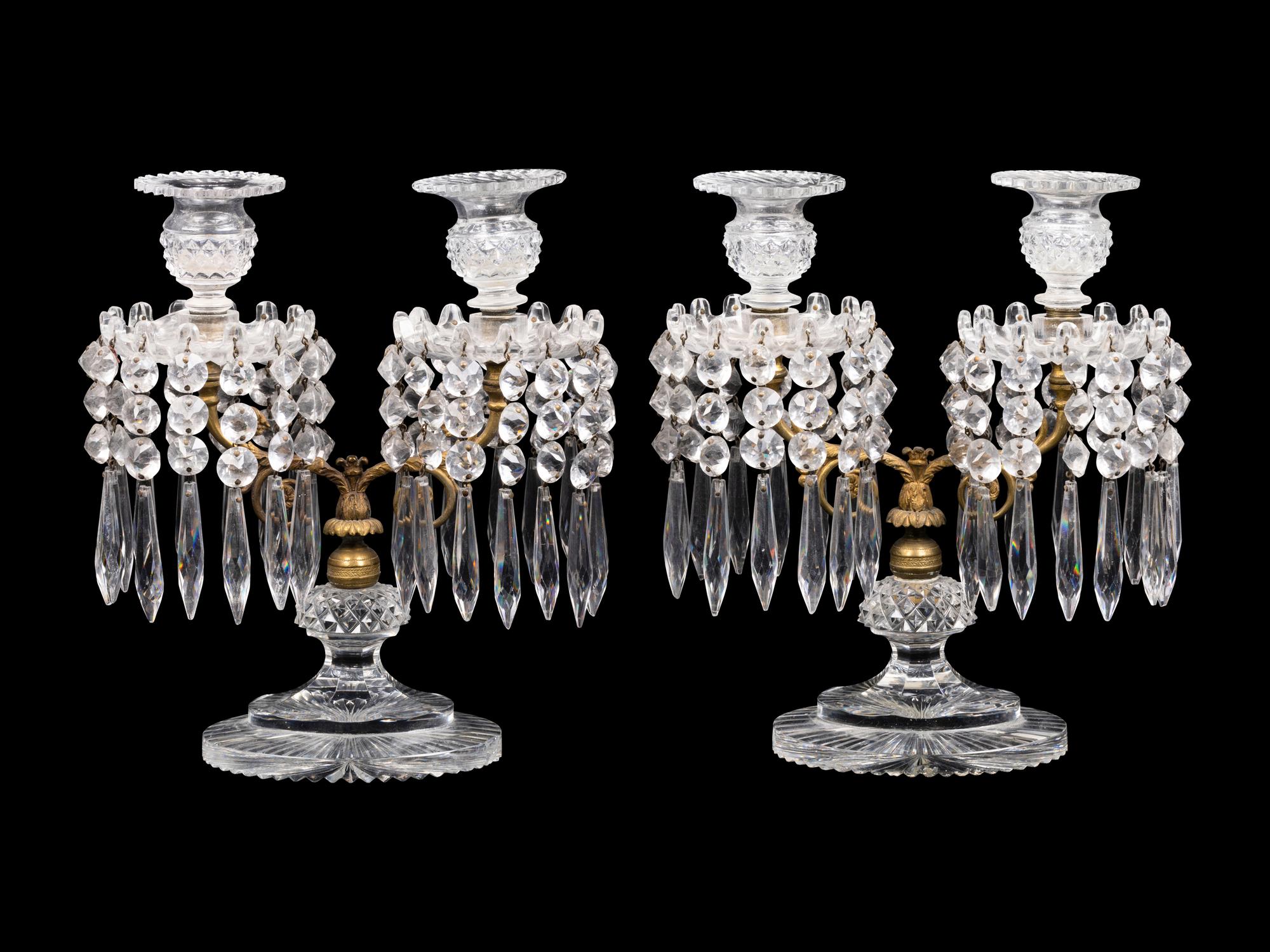 A Pair of Continental Gilt Metal and Cut Glass Two-Light Candelabra