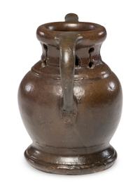 A Rare William Rowley Slip-Glazed Puzzle Jug