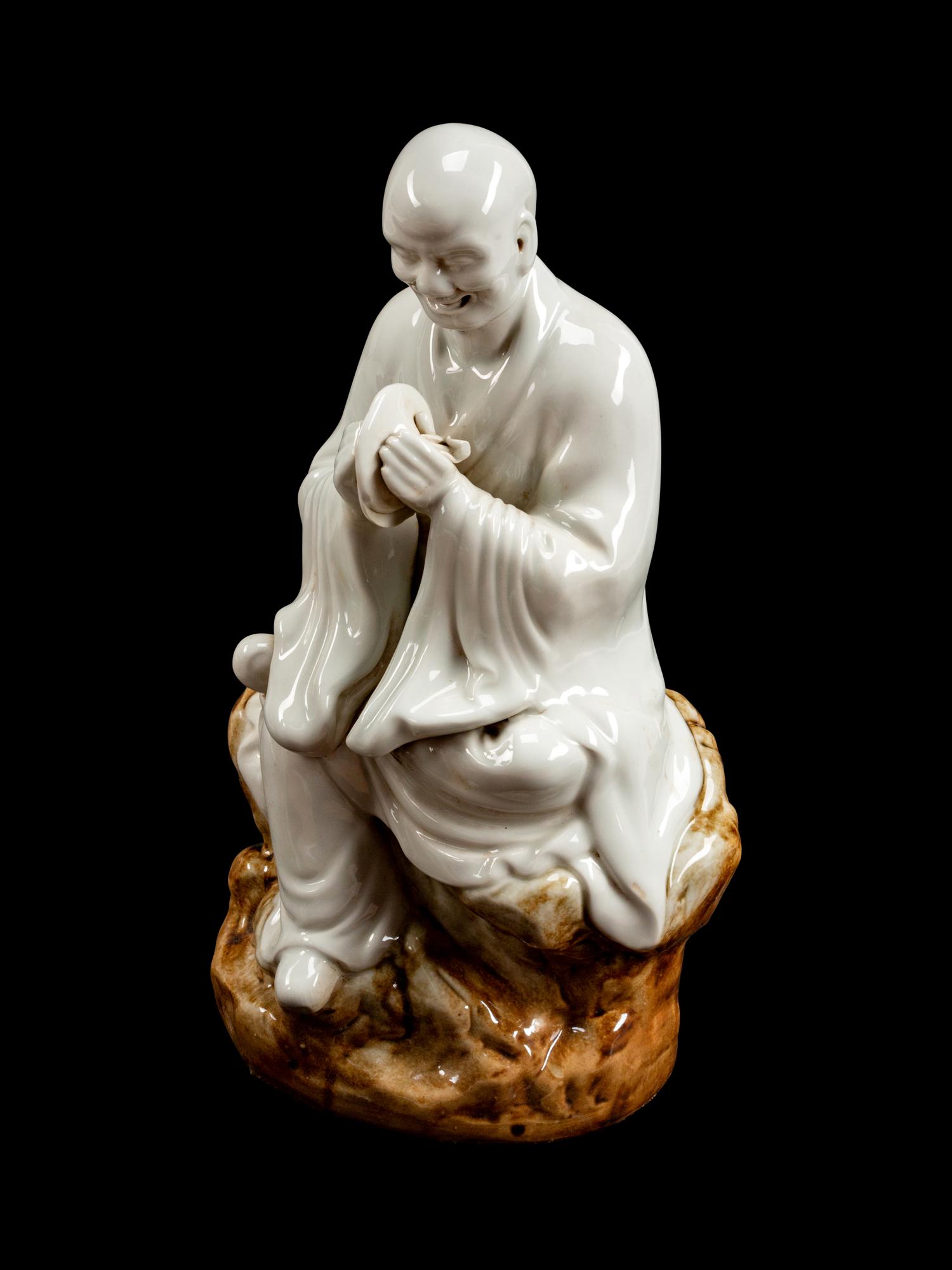 A Set of Eighteen Chinese Porcelain Figures of Lohans
