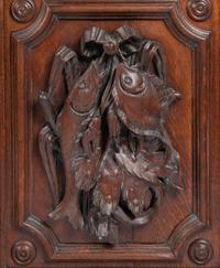 A Continental Carved Oak Cabinet