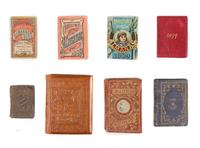 [MINIATURE BOOKS]. A group of 8 miniature books, comprising: