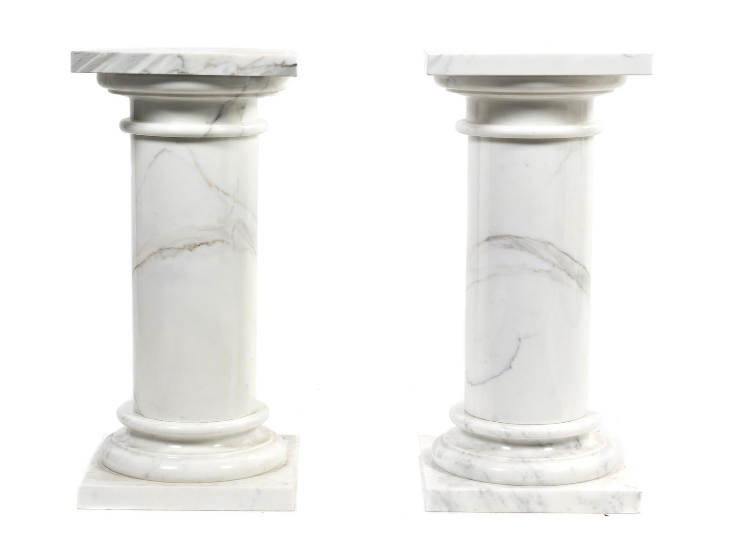 A Pair of White Marble Pedestals, Height overall 29 1/2 inches.
