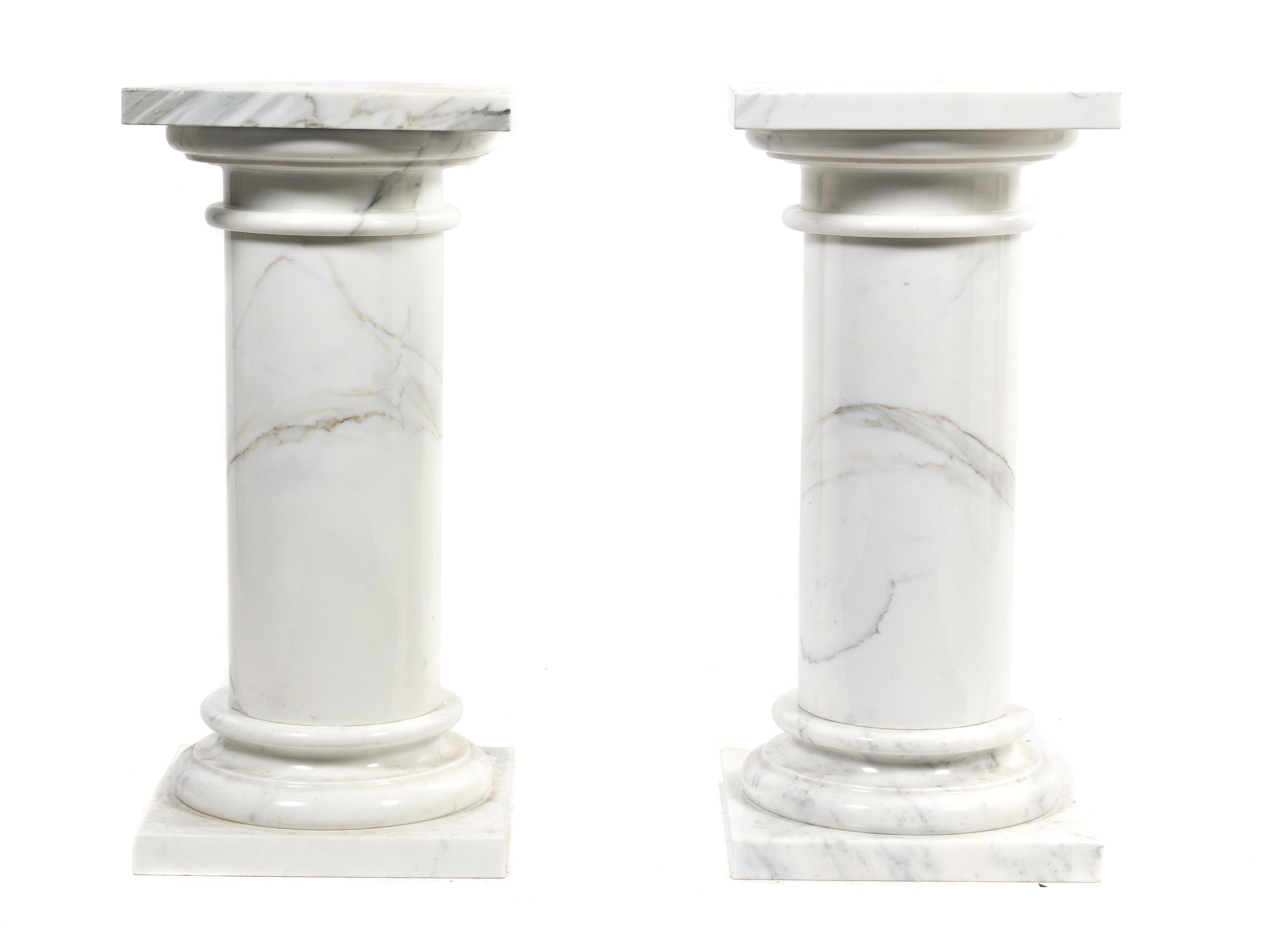 A Pair of White Marble Pedestals, Height overall 29 1/2 inches.