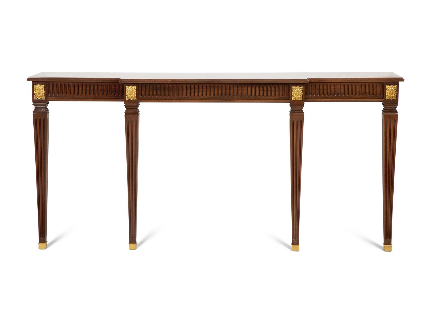 A Louis XVI Style Parcel Gilt Mahogany Console Table