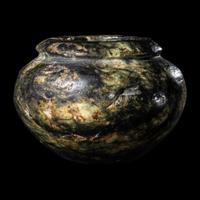 An Egyptian Serpentine Cosmetic Vessel