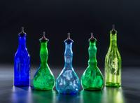 Five Green and Cobalt 'Mary Gregory' Glass Barber Bottles