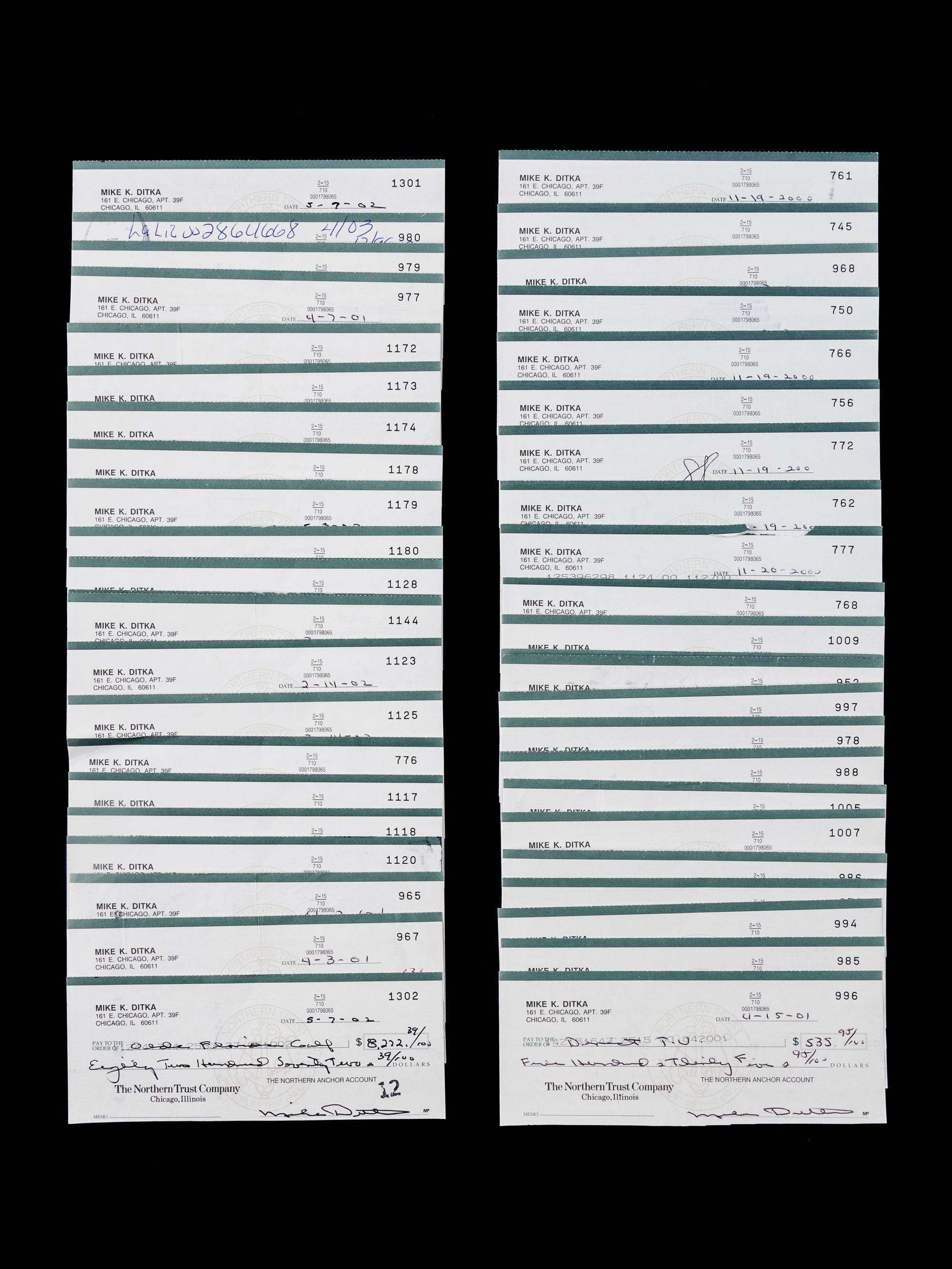 A Group of 50 Mike Ditka Signed Autograph Personal Checks From The Collection of Mike Ditka