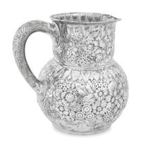 A Tiffany and Co. Silver Repousse Water Pitcher