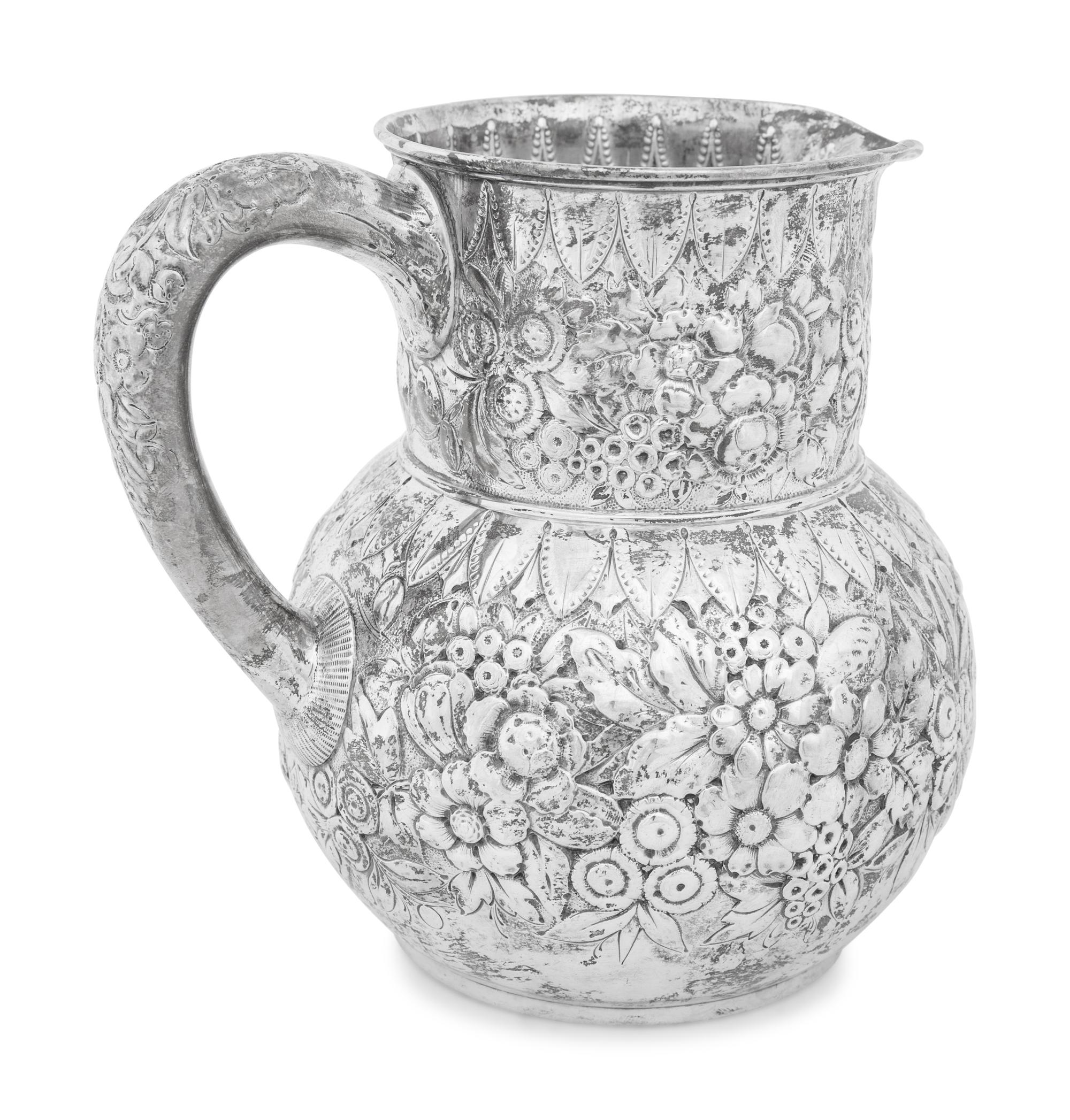 A Tiffany and Co. Silver Repousse Water Pitcher