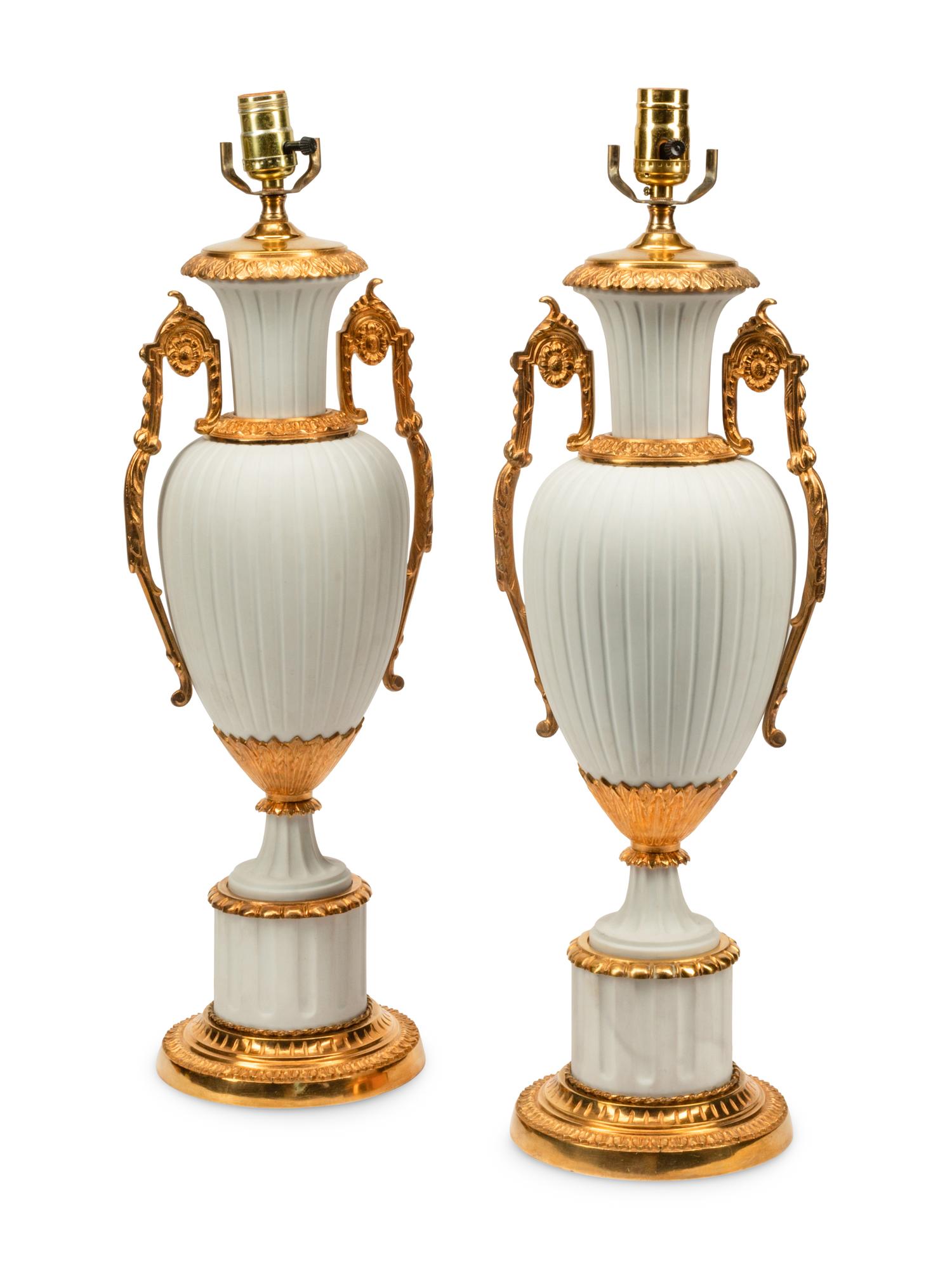 A Pair of Gilt Metal Mounted Bisque Porcelain Lamps