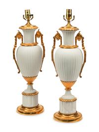 A Pair of Gilt Metal Mounted Bisque Porcelain Lamps
