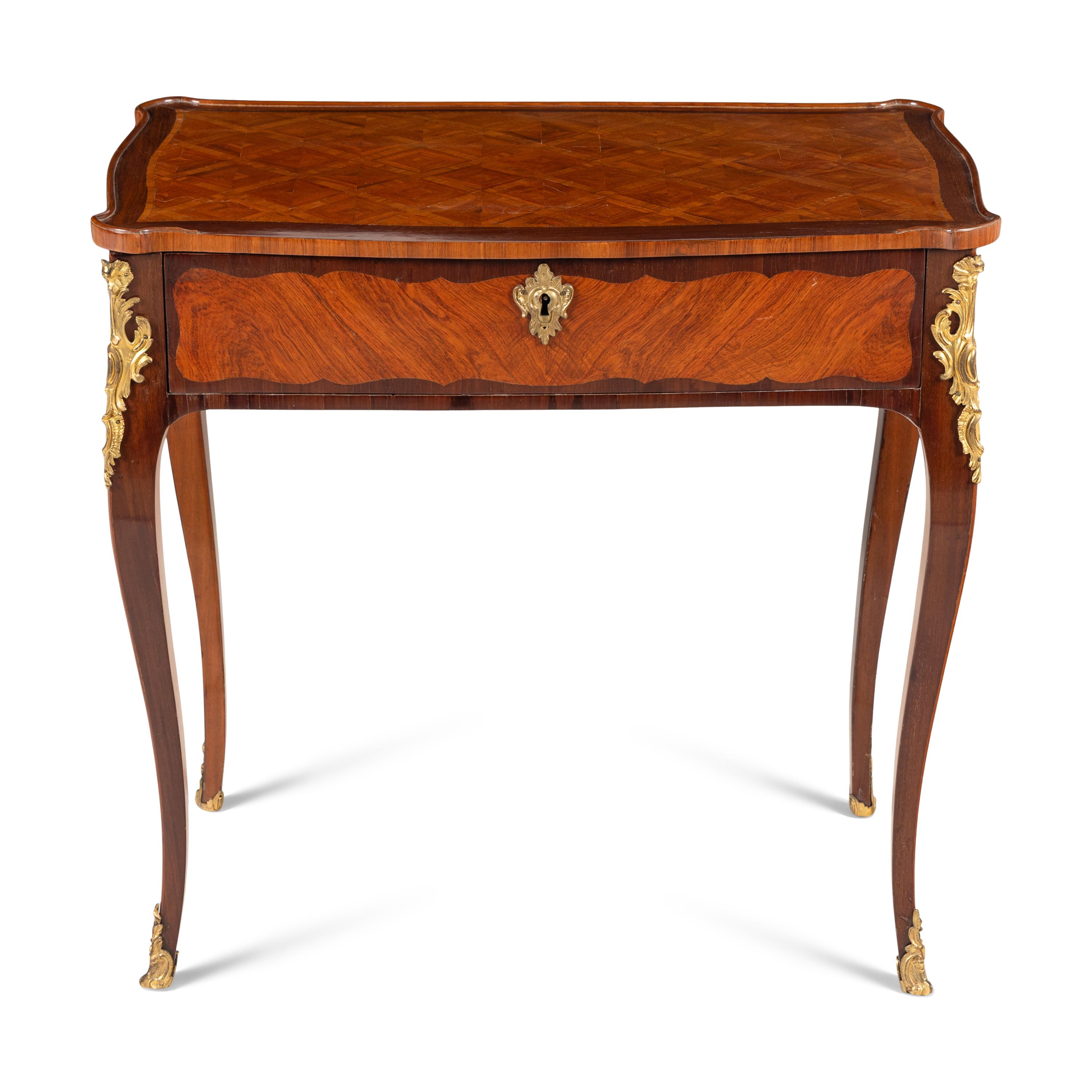 A Louis XV/XVI Transitional Gilt Bronze Mounted Amaranth, Tulipwood and Parquetry Table à Écrire