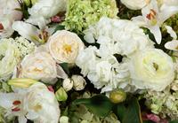 A Monumental Faux Floral Arrangement in an Aluminum Urn form Base — 20th Century