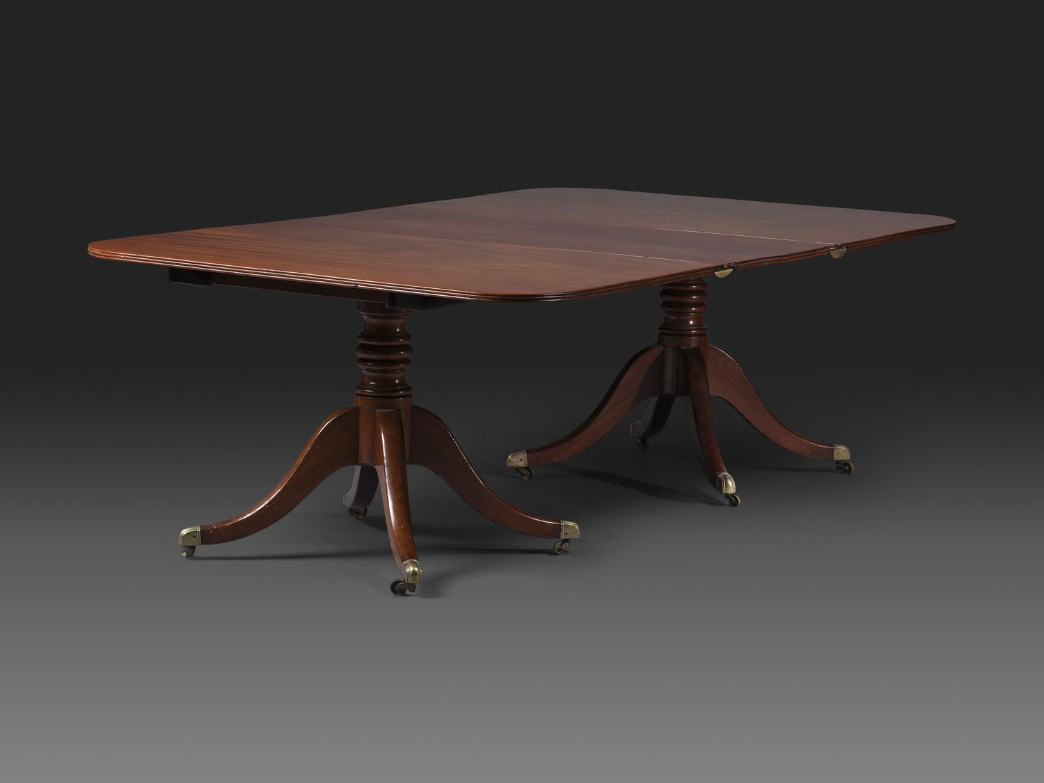 A Federal Mahogany Double Pedestal Extension Dining Table