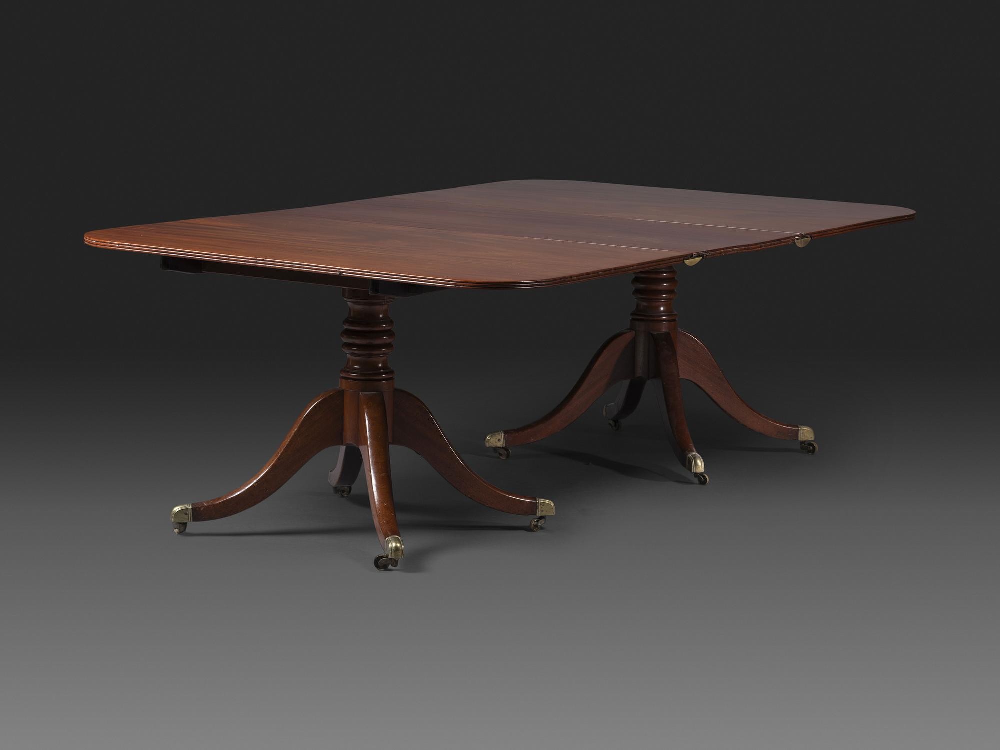 A Federal Mahogany Double Pedestal Extension Dining Table
