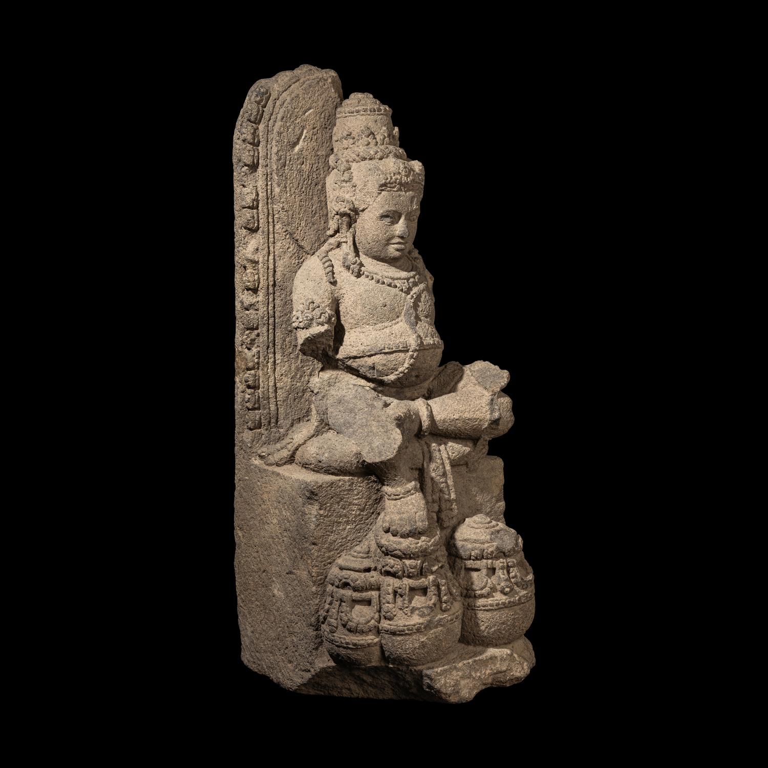 An Indonesia Figure of Kubera, Central Java, 9th Century 九世紀 爪窪石雕毗罗坐像