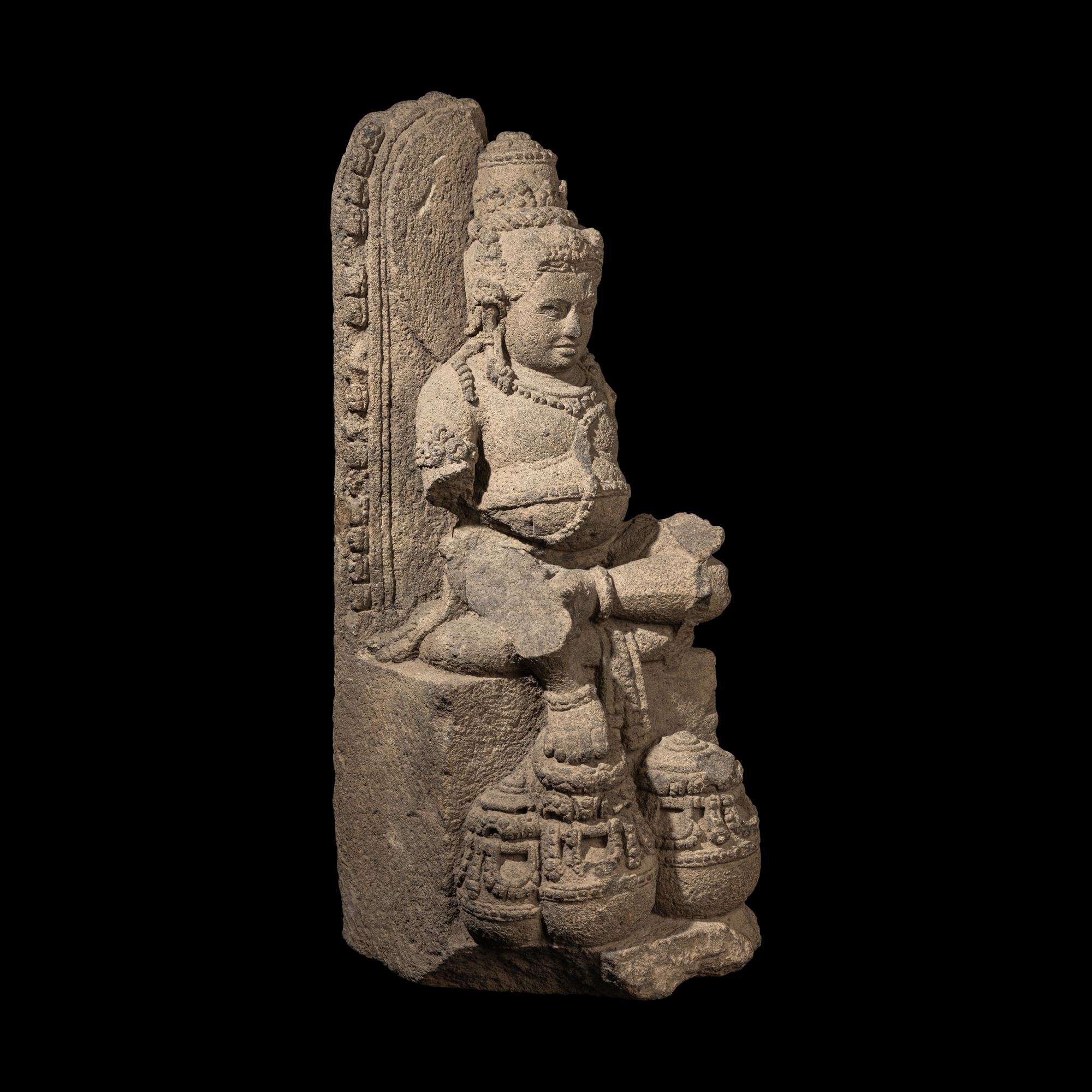 An Indonesia Figure of Kubera, Central Java, 9th Century 九世紀 爪窪石雕毗罗坐像